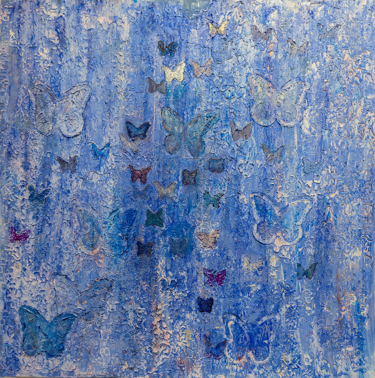 Square textured painting in cobalt and pale blue with scattered butterflies in teal, violet, navy and white.